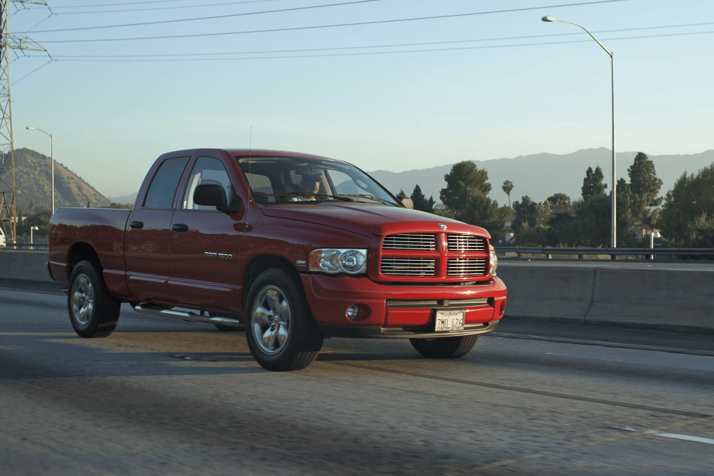 red pick-up truck on road