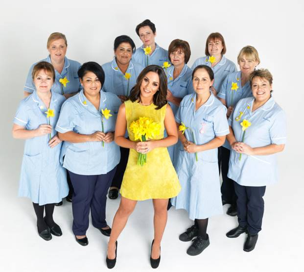 frankie bridge and nurses stood together smiling at camera