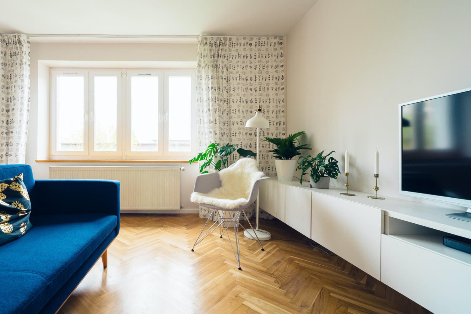 modern living room with blue sofa