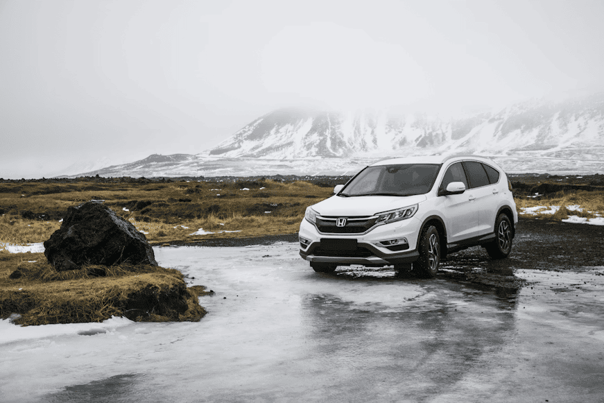 white car on wet moors