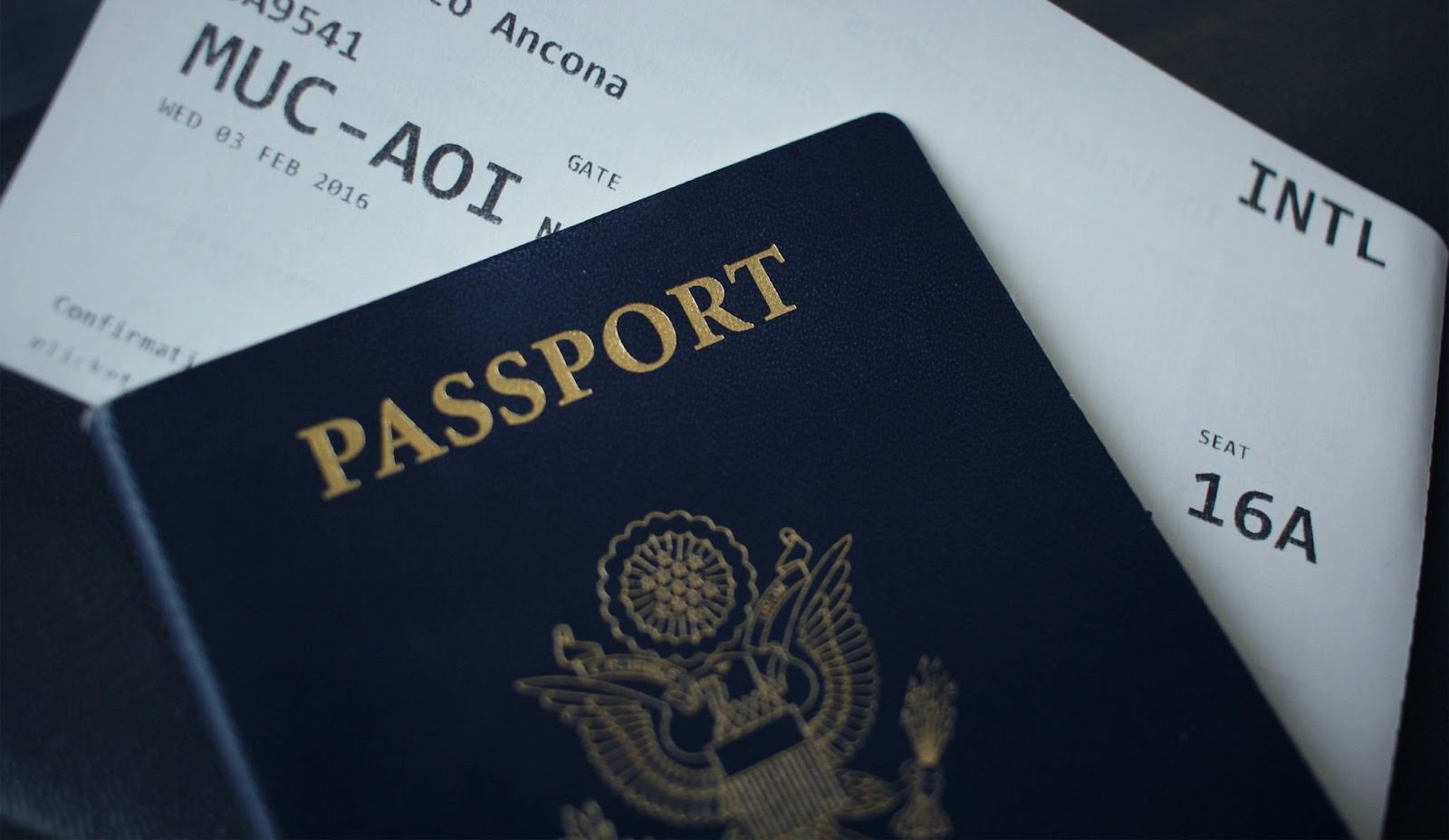 passport and flight ticket boarding pass
