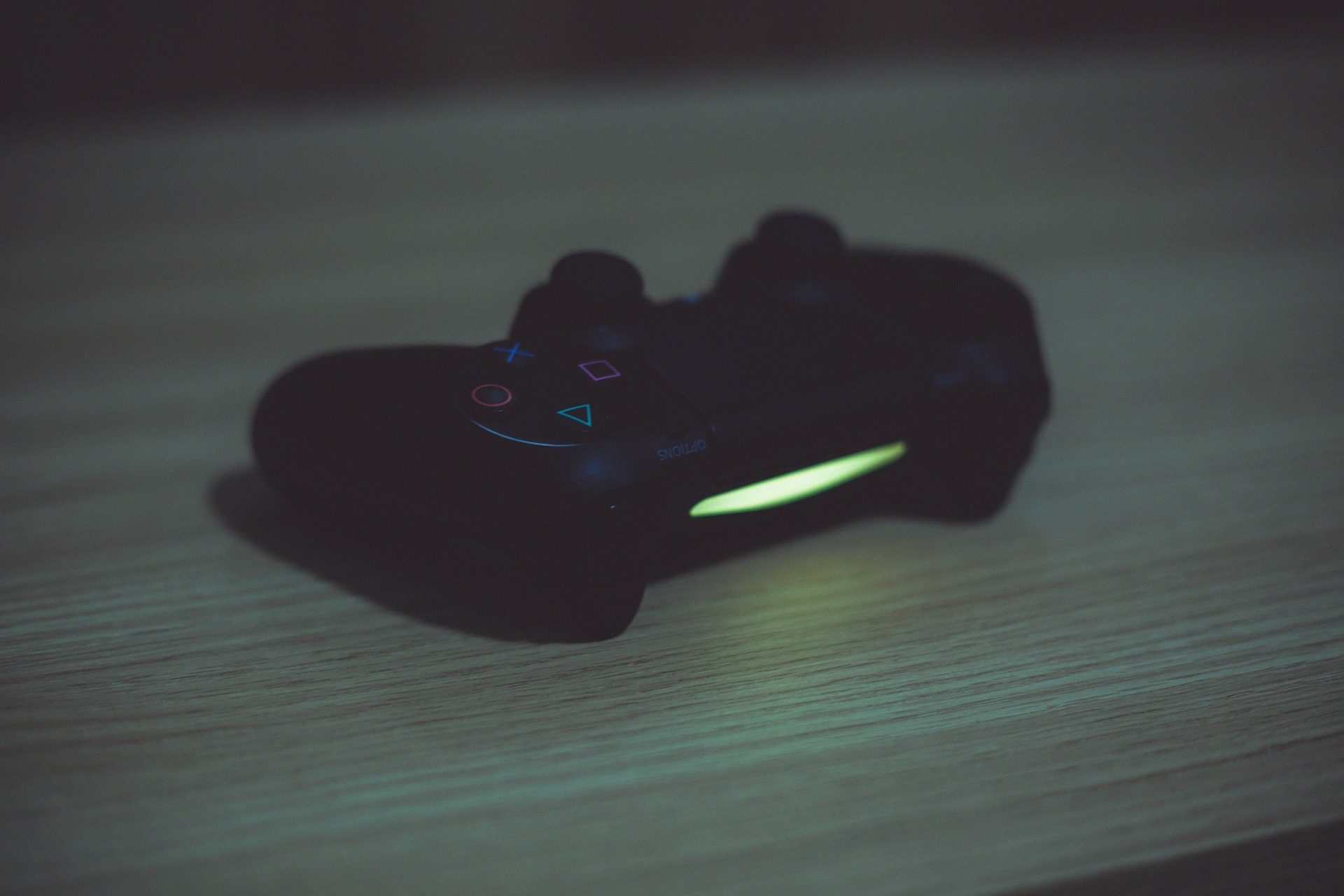 black games controller on surface