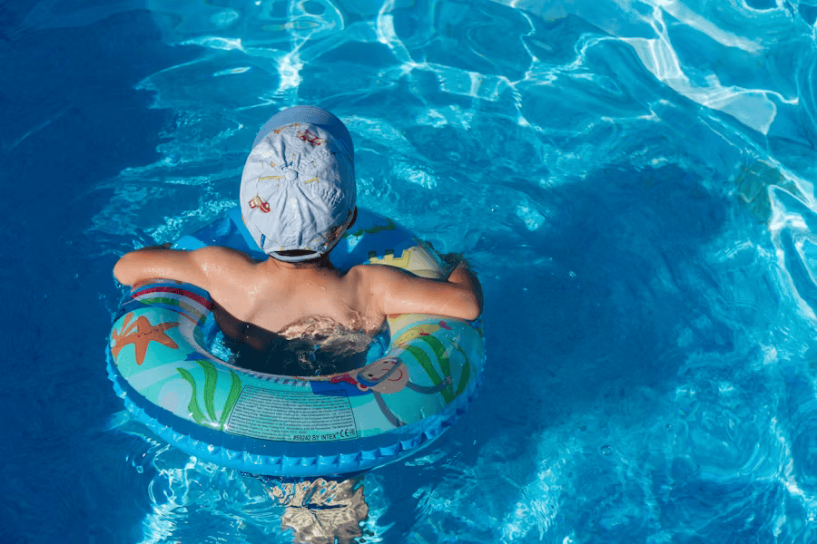 child in swimming pool